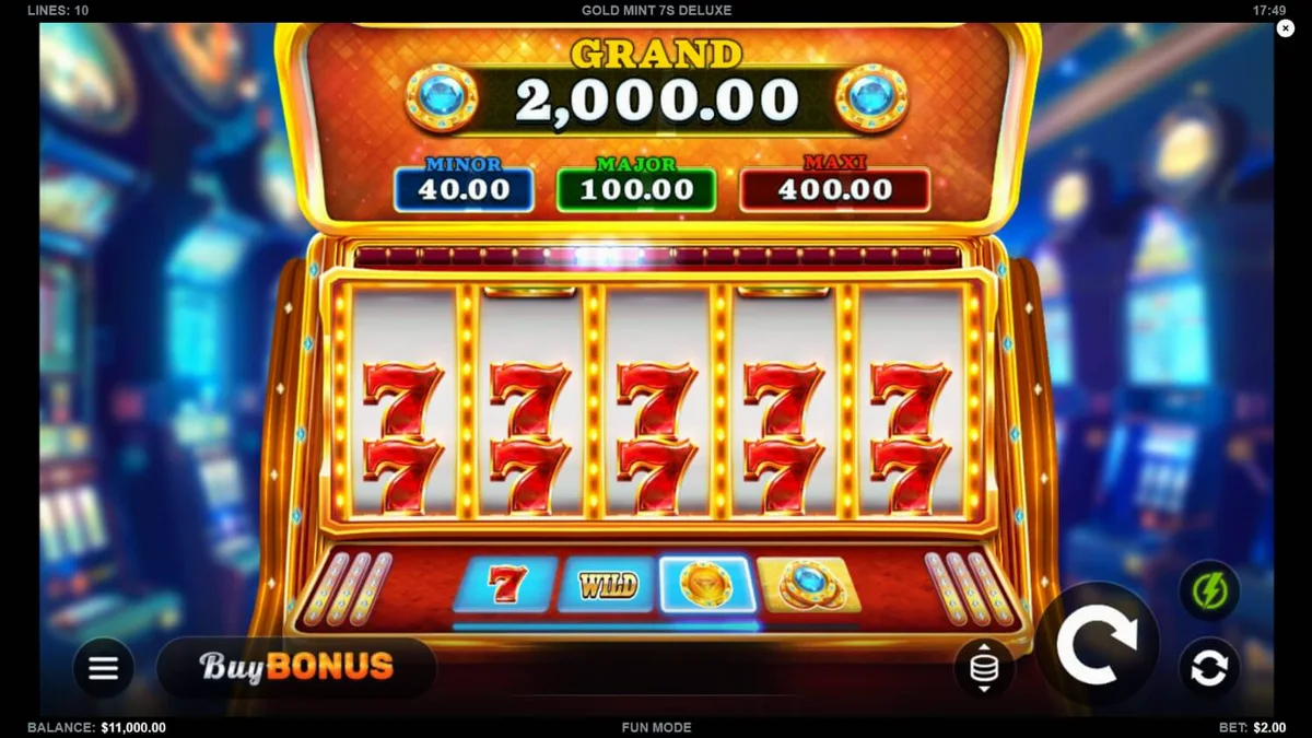 Tampilan visual mewah slot Gold Mint 7s Deluxe dengan simbol emas dan permata.